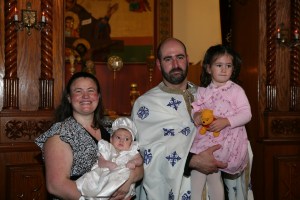 Father C, Presvytera Dina, and their children Maria and Joanna