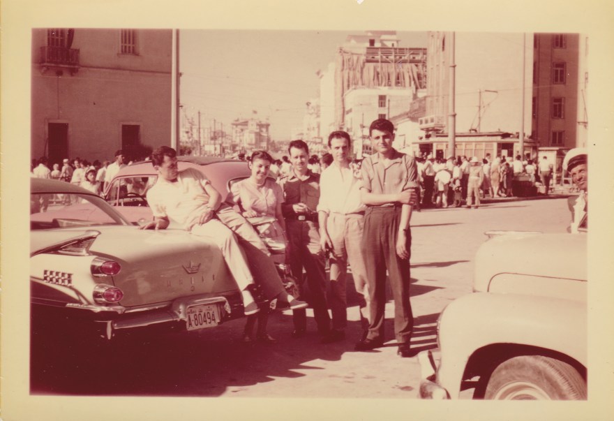 Ted Brusalis (on car) on his right his future koumbara Andromache